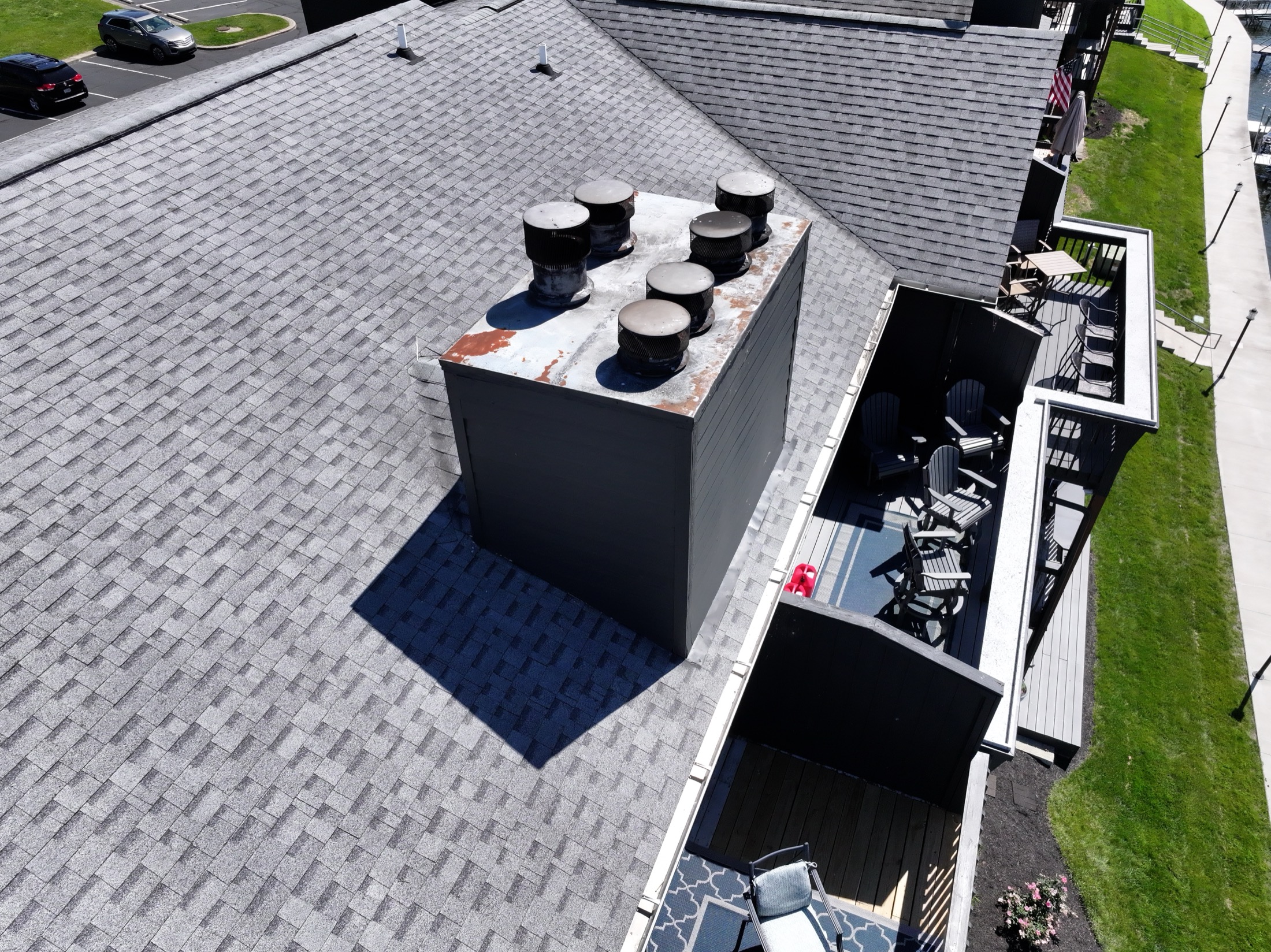 Large chimney and roof plane at the Clarendon Drive roof