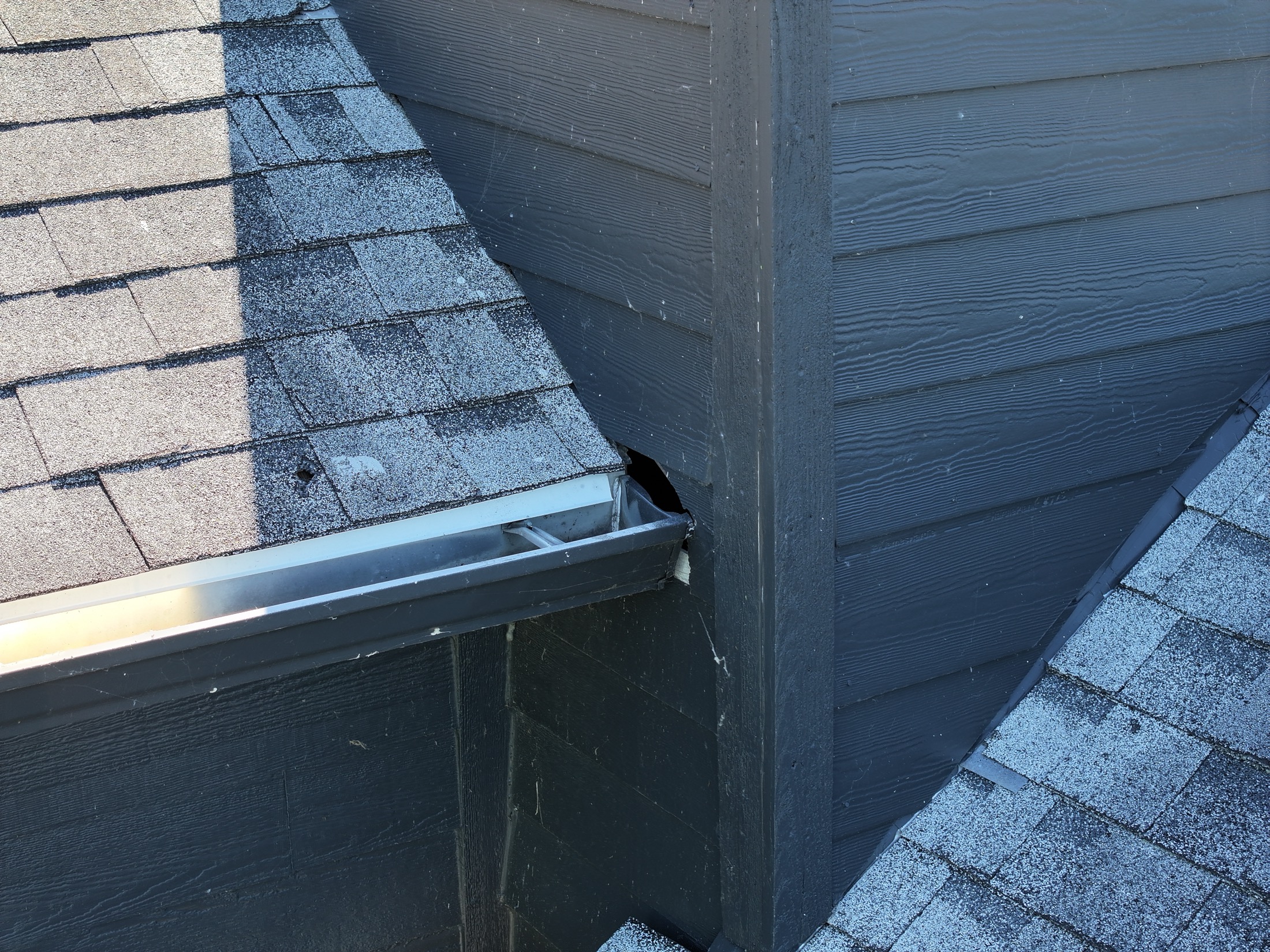 Inside roof-wall corner and gutter detail at 102 Clarendon Drive